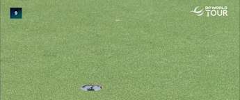 Jason Day drains a huge putt at the 9th