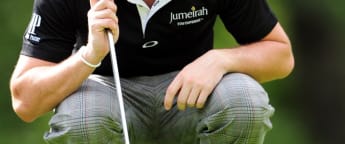 McIlroy retains control in Shanghai