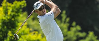 Battling Bekker maintains lead after Swiss drama