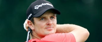 Rose tees off with Woods in Open