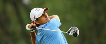 Aguilar leads as play suspended in Beijing