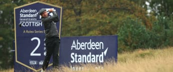 Rock stays solid in testing conditions to lead in Scotland