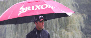Borja battles Roman rain to share lead