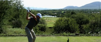 Record-breaker Schwartzel poised for history bid