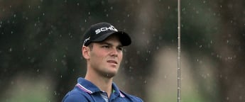 Kaymer races three clear