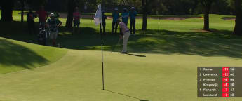 Nikhil Rama chips from on the green to save par at 17th