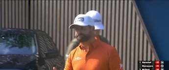 Matthew Baldwin hits it close at the par-three 14th to rejoin the leaders