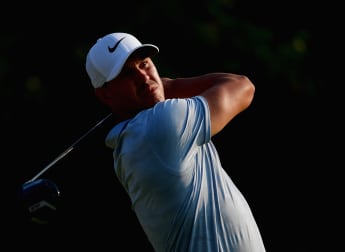 Koepka leads but Tiger on the prowl