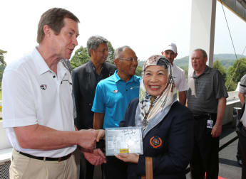 Queen of Malaysia plays in pro-am
