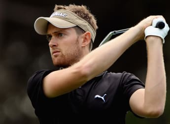 Moul stays in front despite mixed round