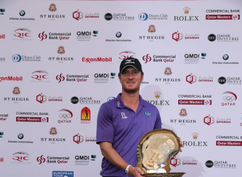 Closing eagle lands victory for Wood