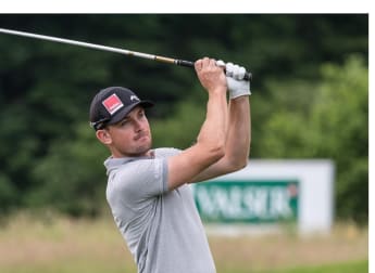 Joel rolls into Swiss lead