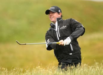 McIlroy slips back