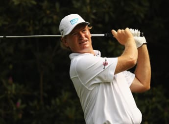 Els claims share of clubhouse lead