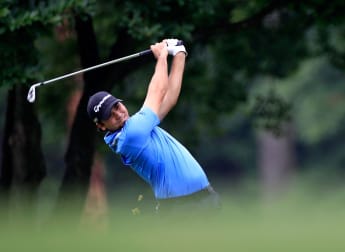 Day sets first round target