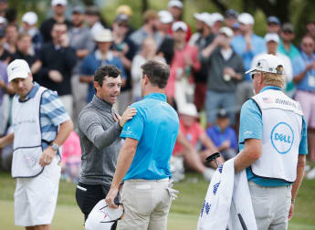 McIlroy moves into quarter-finals