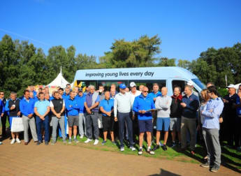 Woodlands School receives Variety Club Sunshine Coach at Travis Perkins Masters