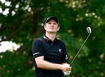 Rose edges ahead at Firestone