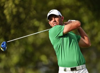 Schwartzel surge puts pressure on Michael