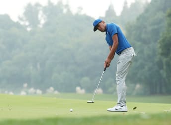 Finau edges ahead in China