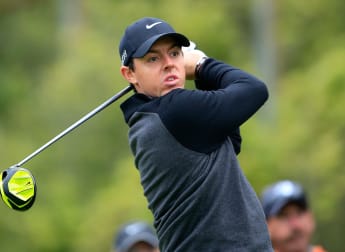 Early bird McIlroy progresses