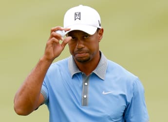 Woods lights up Firestone