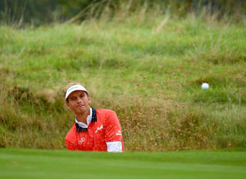 Luiten retains slender advantage