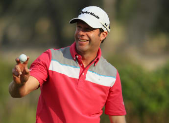 Dredge leads the way in Doha