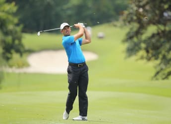 Schwartzel surges clear
