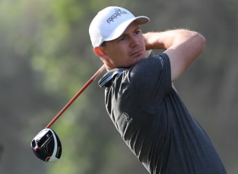 Jensen takes early lead in Dubai