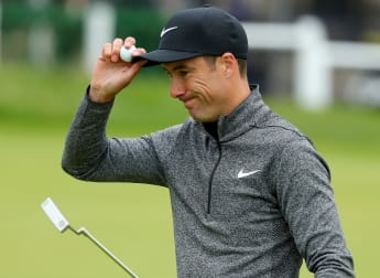 Fisher takes one-shot lead into third round