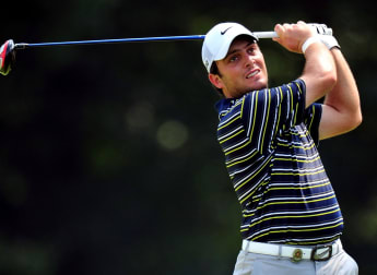 Molinari happy despite late blip
