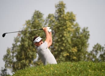 Poulter brushes off jet lag to fly into contention