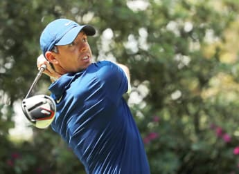 McIlroy trims Johnson's lead