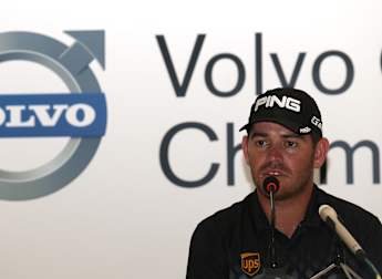 Els and Oosthuizen shine in the rain