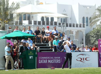 Wilson holds narrow advantage in Doha