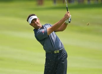 Immelman claims first round lead