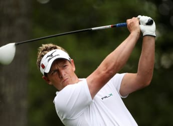 Donald climbs into contention