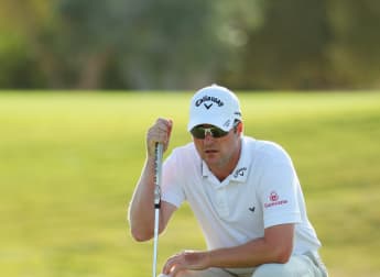 Warren edges ahead in Portugal