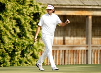 Watson overcomes Oosthuizen to land Green Jacket