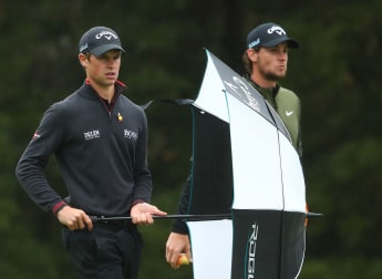 Belgium share lead in wet and windy Melbourne