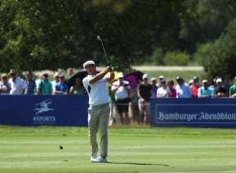 DeChambeau keeps hold of Germany lead
