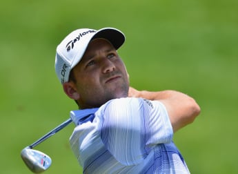 Garcia edges ahead at sombre Sun City