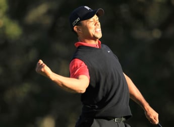 Woods returns to winning ways
