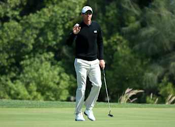 Colsaerts joins Lawrie at the top