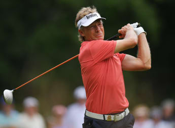 Triplett and Perry keep Langer at bay