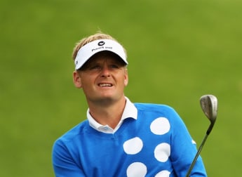 McGinley closes in on Kjeldsen