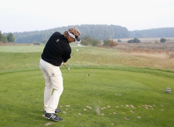 Langer takes share of lead on home soil