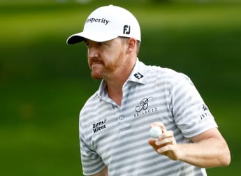 Walker finds form to lead at Firestone