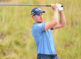 Stenson surges into a share of the lead
